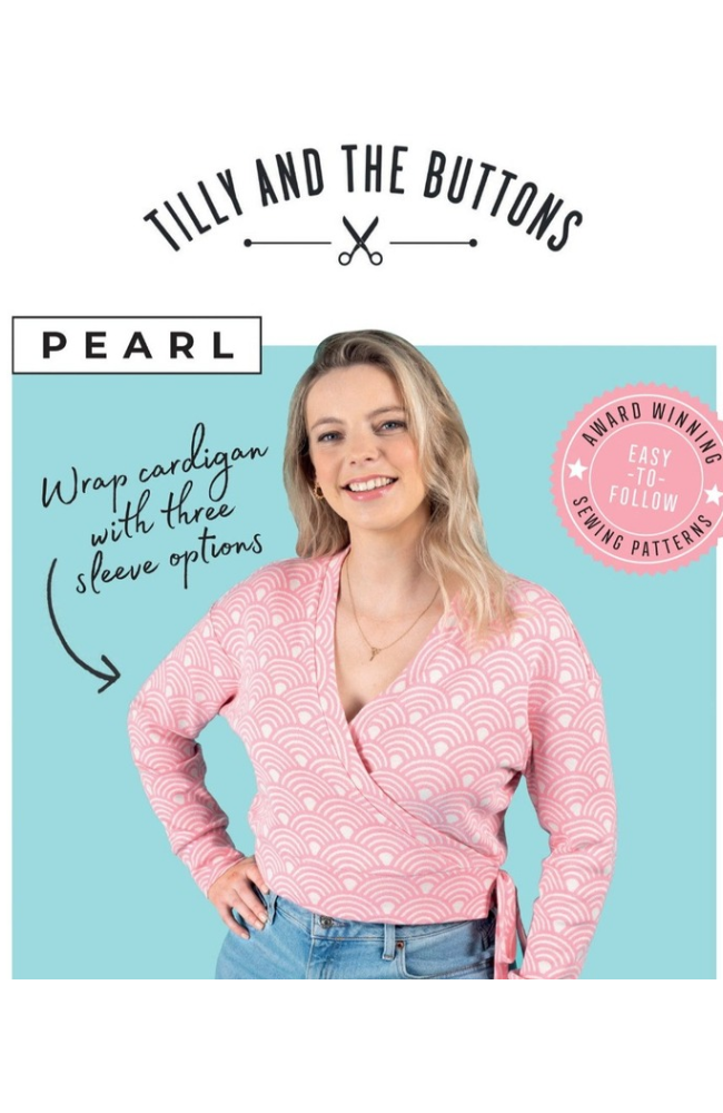 Model in a pink print wrap cardigan on a blue and white background with Tilly and the Buttons branding and text.