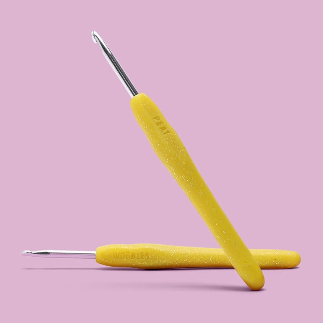 Yellow sparkle crochet hook