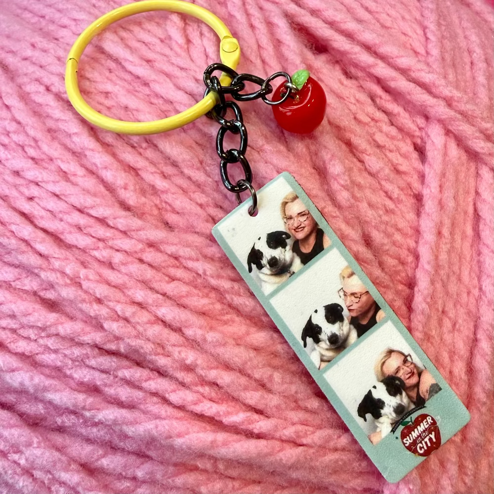Keychain with photo strip and apple on pink yarn