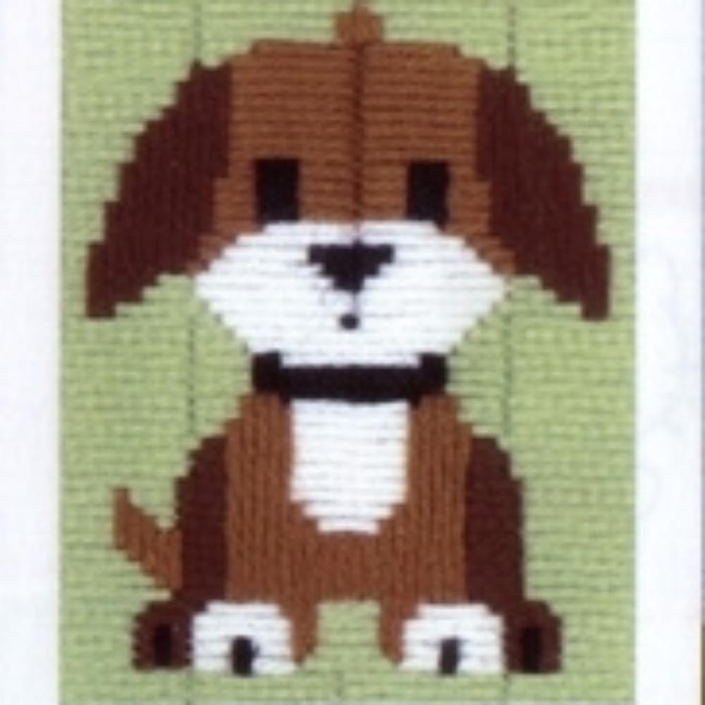 Brown dog needlework canvas with a green background