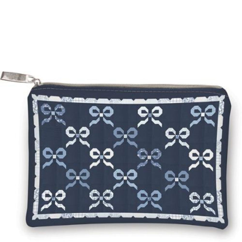 Navy pouch with white bow pattern on a white background