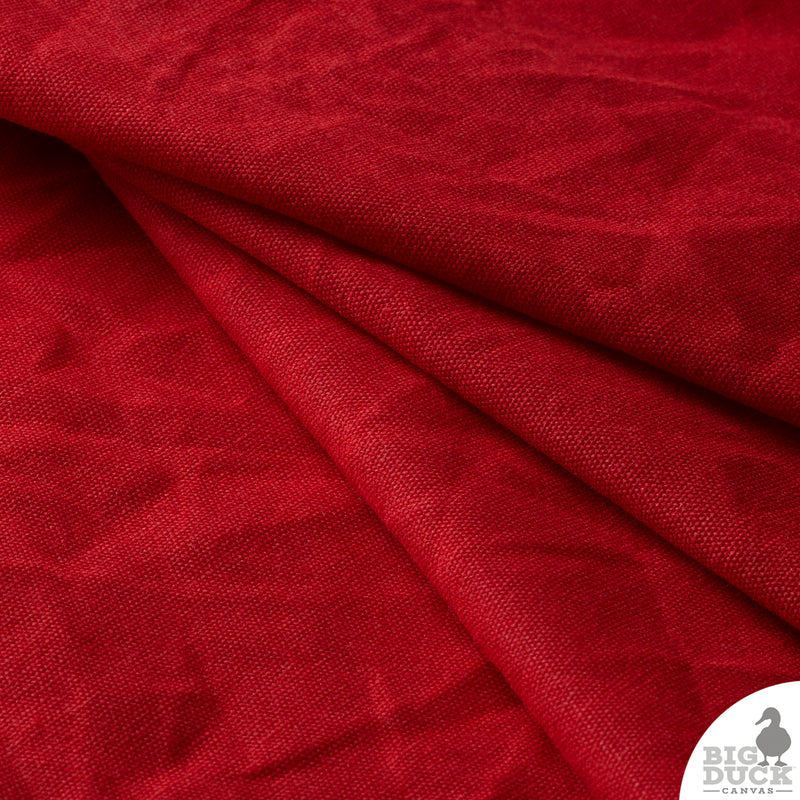 Red canvas fabric that's waxed for water-resistance.