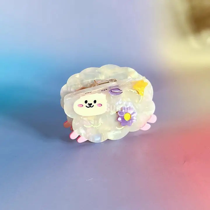 Cute cartoon sheep hair claw with a colorful background