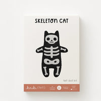 Skeleton cat felt doll kit packaging on a white background