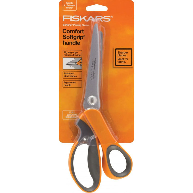 Fiskars scissors with orange handle and packaging on a white background