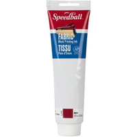 A tube of Speedball Fabric Black Printing Ink in the shade Red, featuring a white, blue, and red label on a plain white background.