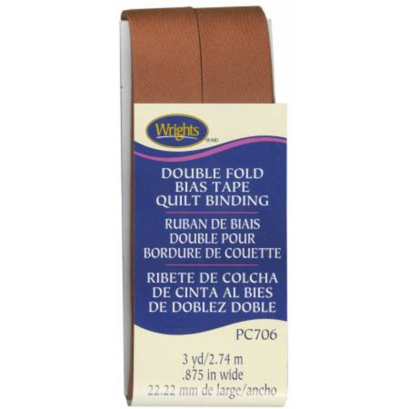 Wrights double fold brown bias tape quilt binding on a white background
