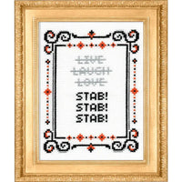 Cross-stitched design with text 'Live Laugh Love STAB! STAB! STAB!' in a decorative frame.