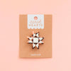 Hair clip on a 'Sarah Hearts' branded card against a pink background