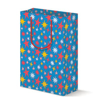Colorful star-patterned gift bag on a white background