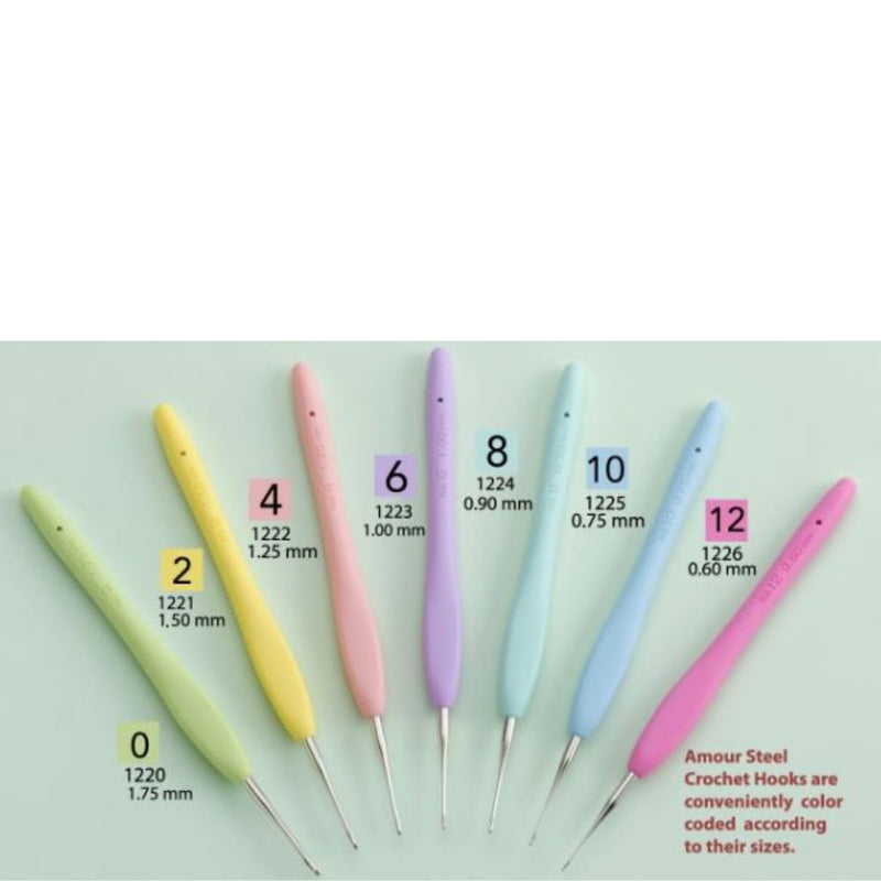 Set of colorful crochet hooks with size markings on a light green background