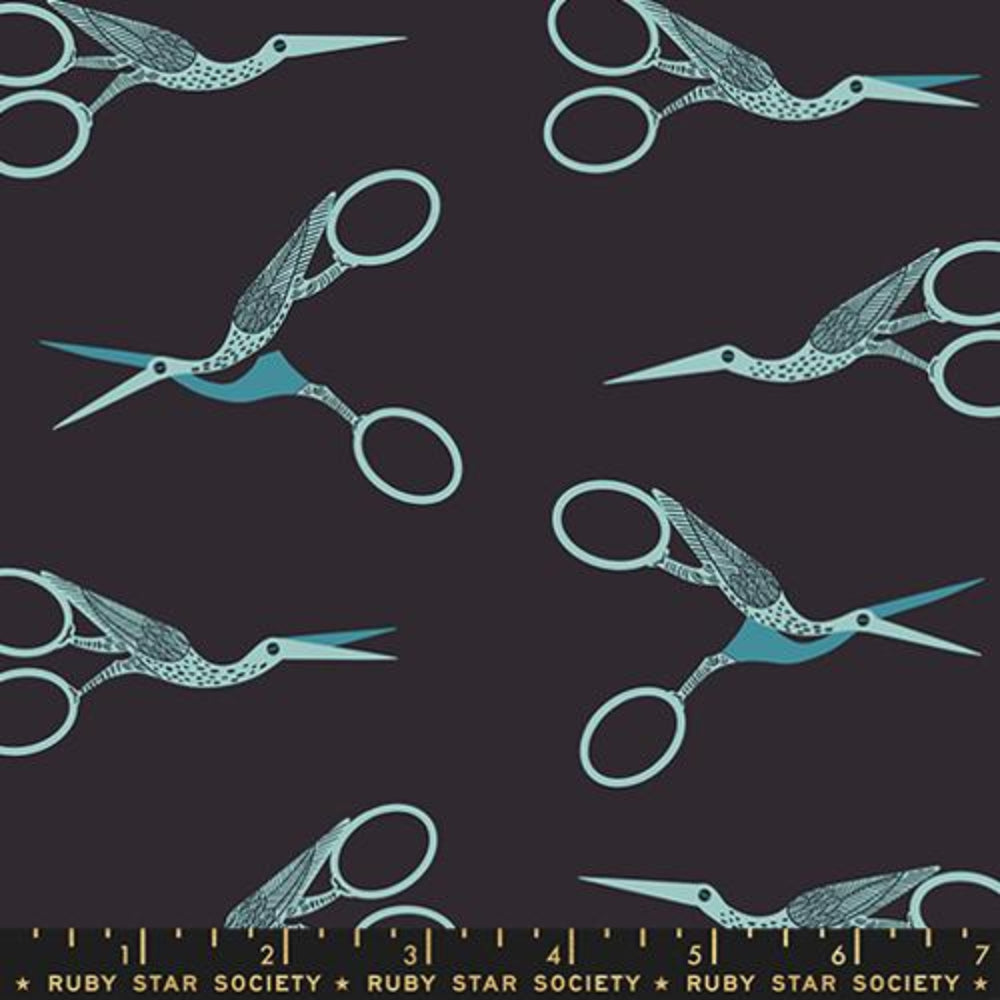 Pattern of blue stork scissors on a dark background with a ruler at the bottom, featuring 'Ruby Star Society' branding.
