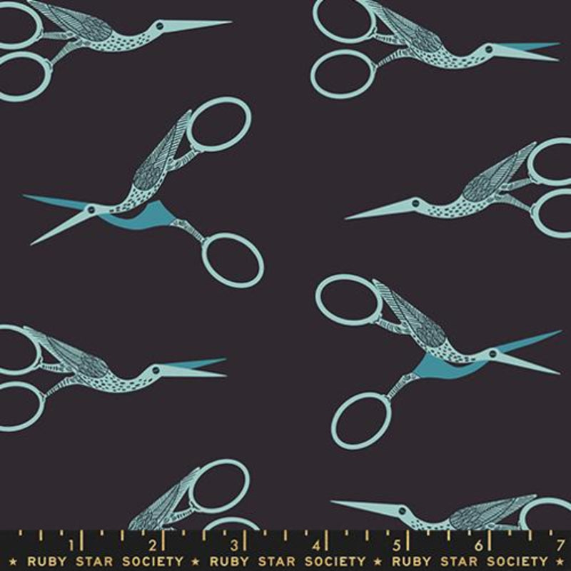 Pattern of blue stork scissors on a dark background with a ruler at the bottom, featuring 'Ruby Star Society' branding.