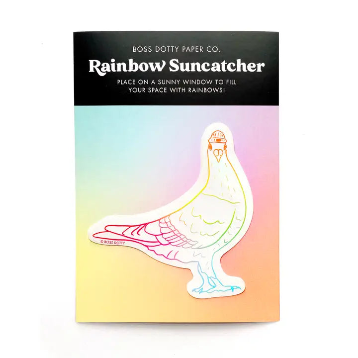 Packaging of a rainbow suncatcher with pigeon design and text on a white background