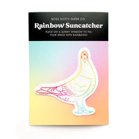 Packaging of a rainbow suncatcher with pigeon design and text on a white background