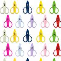 A variety of colorful mini-scissors with matching covers arranged on a white background