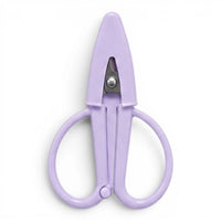 A small lavender pair of scissors with a matching point protector on a white background