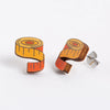 Wooden measuring tape earrings on a white background