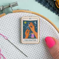 Tarot card needle minder