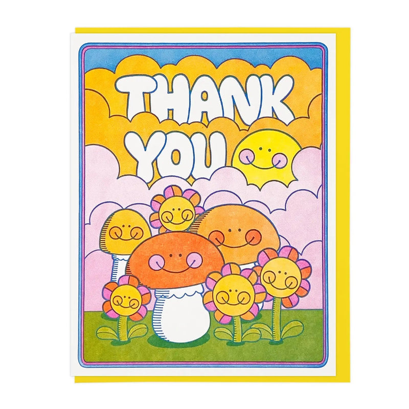 A colorful greeting card with a retro-style illustration that reads 'THANK YOU' in large white letters. The artwork shows smiling sunflowers, mushrooms, and a smiling sun  in pastel and bright colors on a white background.