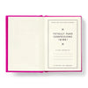 Open book with a pink cover displaying text about 'Totally Fake Confessions'.
