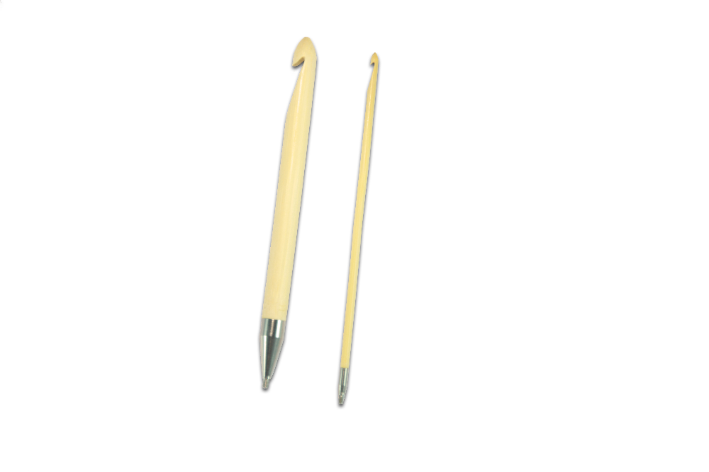 Two wooden tunesian crochet hooks on a white background