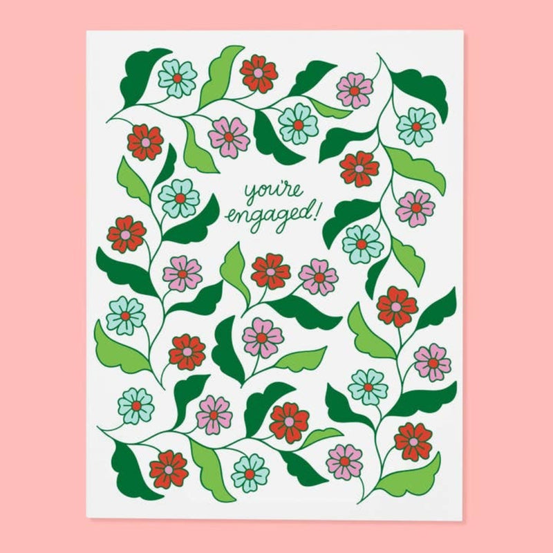 Floral card with 'you're engaged!' text on a pink background