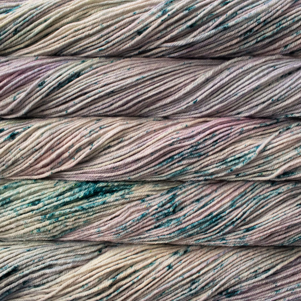 Multiple rows showing different sections of a skein of yarn with a pink, blue, and muted green colorway. 