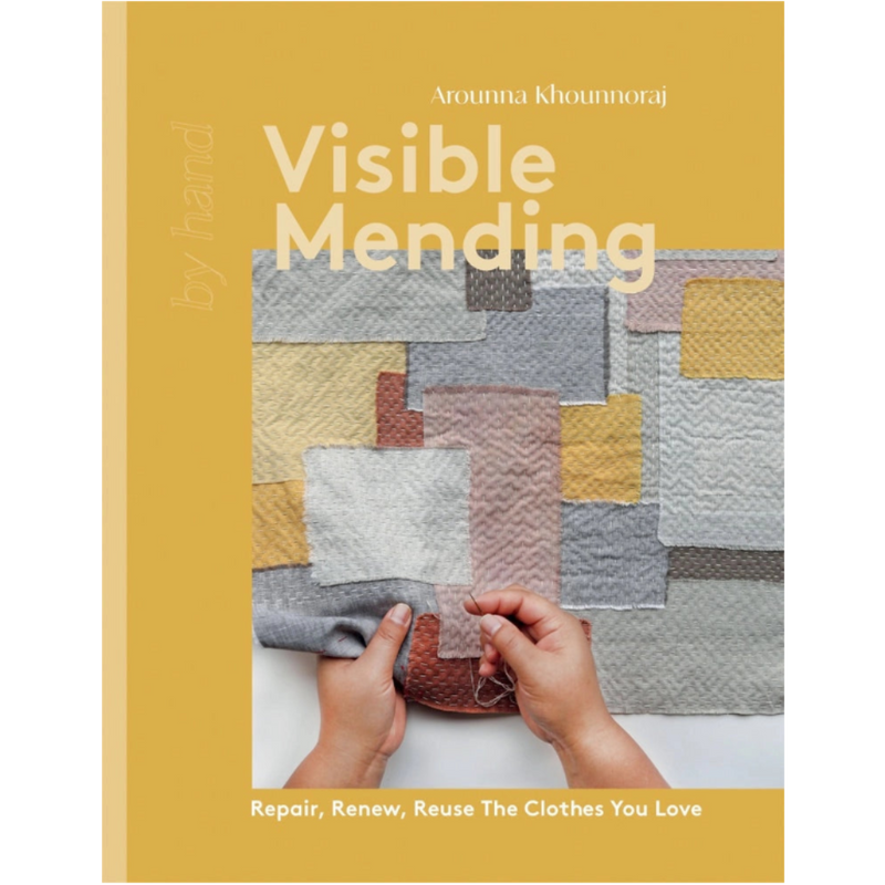 Book cover of 'Visible Mending' with hands repairing patchwork fabric on a yellow background.