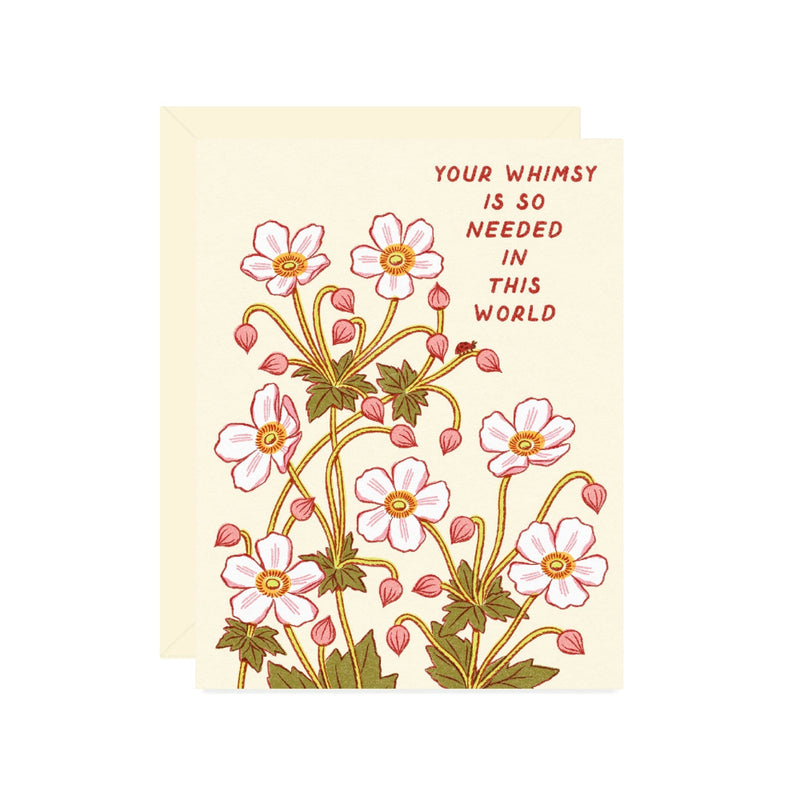 Greeting card with floral design and text "Your whimsy is so needed in this world" on a beige background