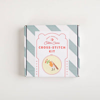 Cotton Clara cross-stitch kit box with striped design on a white background