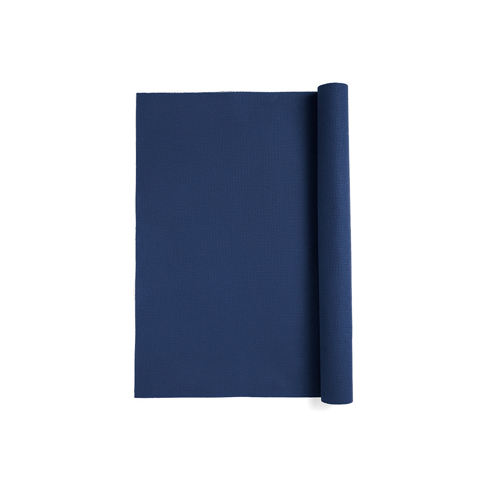 A piece of navy blue aida cloth on a white background